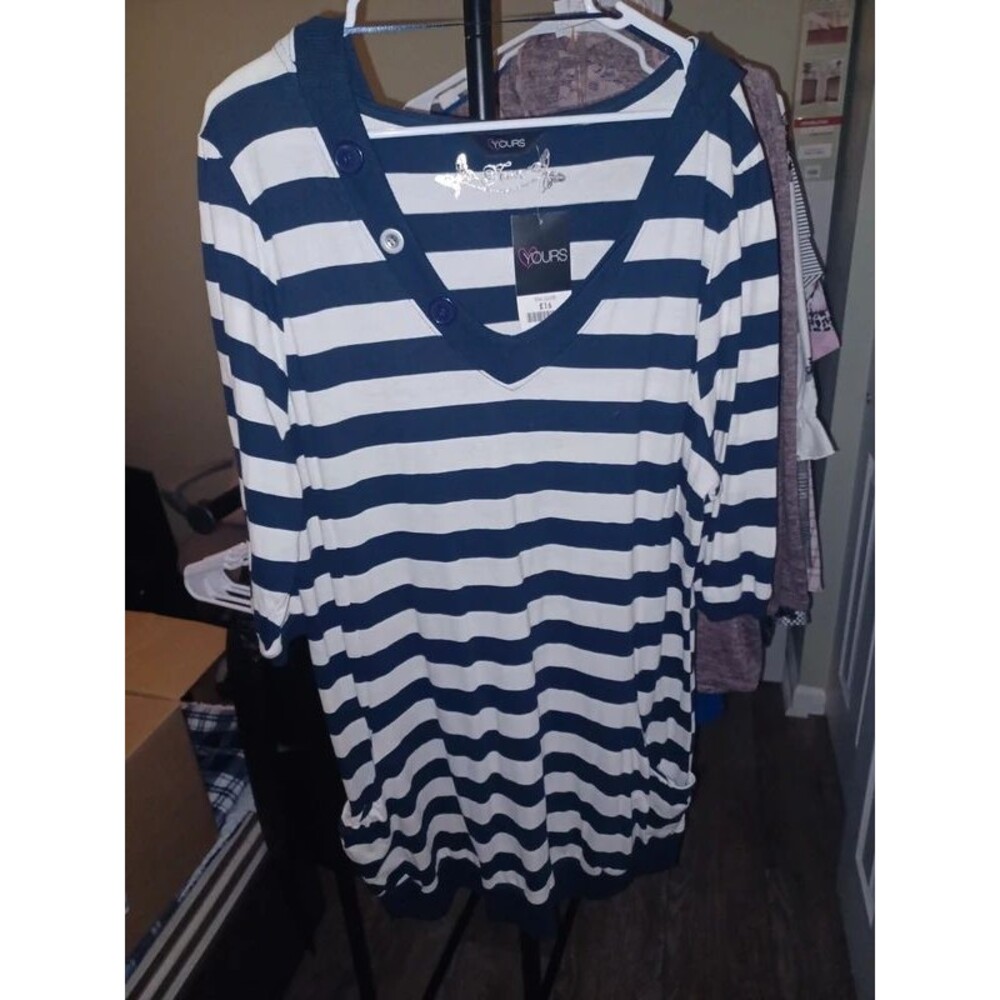 Fits like a 18/20 cute new with tags. Can't believe still available.